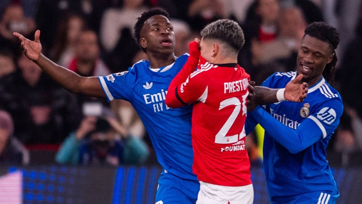 February 17, 2026, Lisbon, Lisboa, Portugal: Gianluca Prestianni of SL Benfica seems with Vinicius Junior of Real Madrid CF during the UEFA Champions League 2025/26 League Knockout Play-off First Leg  ...