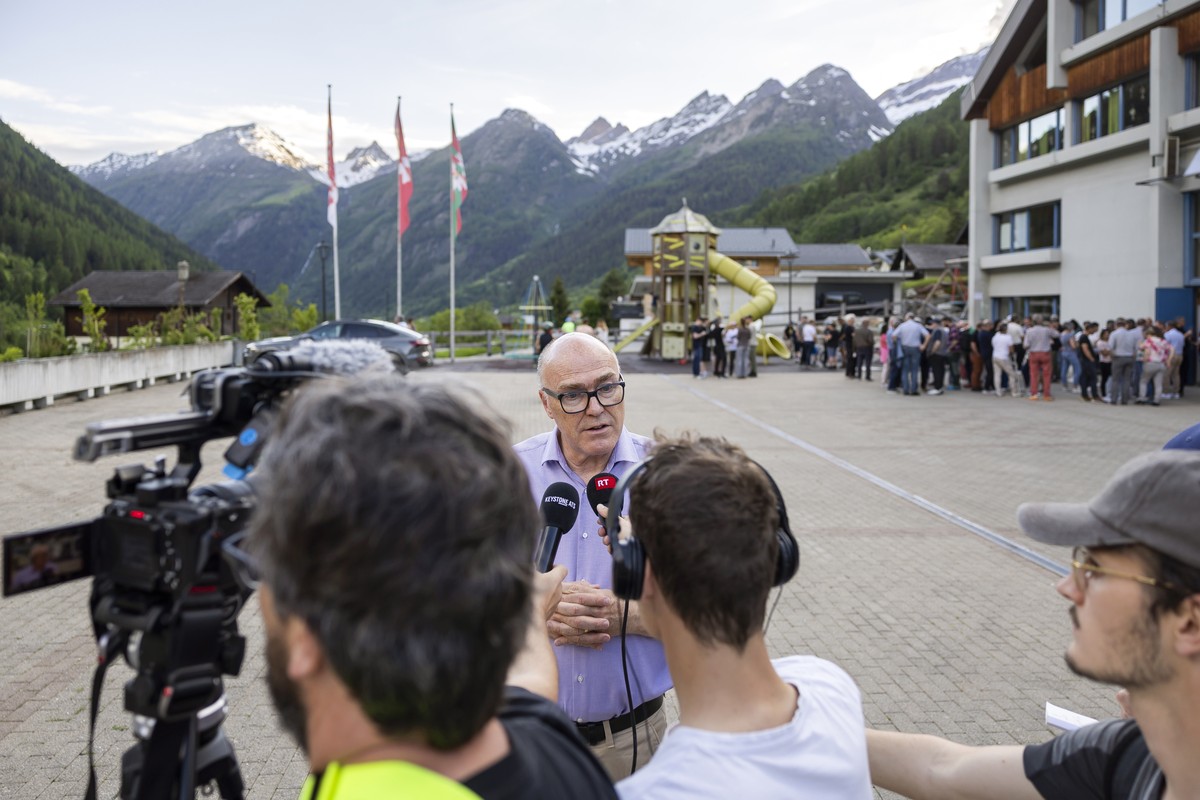 epa12147649 Swiss Federal Councillor Martin Pfister speaks to journalists after meeting with residents in Wiler, after a landslide destroyed the village of Blatten, in Wiler, Switzerland, 31 May 2025. ...