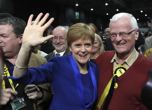 Scottish First Minister Nicola Sturgeon waves at the SEC Centre in Glasgow during the declaration in her constituency in the 2019 general election, Friday Dec. 13, 2019. An exit poll in Britain&#039;s ...