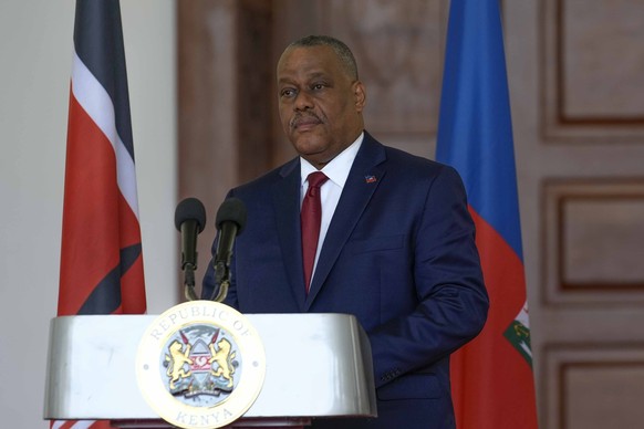 FILE - Haiti Prime Minister Garry Conille speaks during a joint press conference with Kenya&#039;s President William Ruto at the State House in Nairobi, Kenya, Oct. 11, 2024. (AP Photo/Brian Inganga,  ...