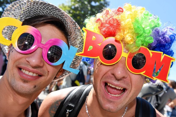 epa05479799 Participants wear fancy costumes at the annual techno parade 'Street Parade' in the city center of Zurich, Switzerland, 13 August 2016. Hundreds of thousands of ravers participat ...