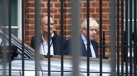 FILE PHOTO: Britain&#039;s Prime Minister Boris Johnson and his special advisor Dominic Cummings leave Downing Street in London, Britain September 3, 2019. REUTERS/Henry Nicholls