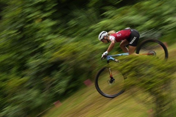 Jolanda Neff of Switzerland competes during the women&#039;s cross-country mountain bike competition at the 2020 Summer Olympics, Tuesday, July 27, 2021, in Izu, Japan. (AP Photo/Christophe Ena)