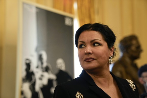 FILE - Russian soprano Anna Netrebko answers reporters&#039; questions prior to the start of a news conference to present Giuseppe Verdi&#039;s &#039;Macbeth&#039;, directed by Italian conductor Ricca ...