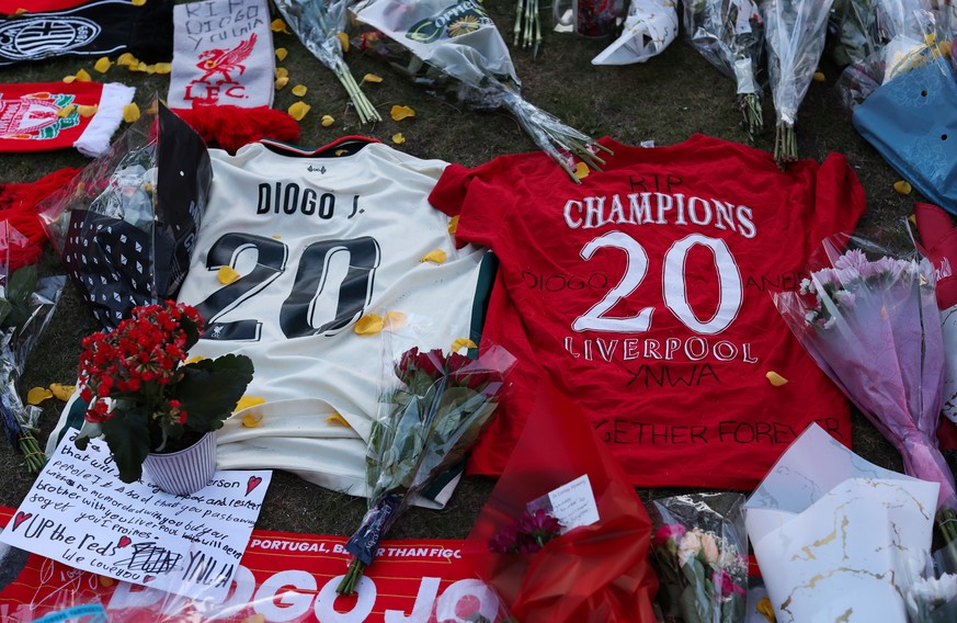 epa12214137 Tributes to soccer player Diogo Jota at Anfield, the home of Liverpool FC in Liverpool, Britain 03 July 2025. Jota died in a car accident in Spain together with his brother Andre Silva on  ...