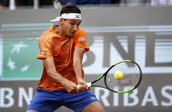 epa07567324 Lorenzo Sonego of Italy in action against Karen Khachanov of Russia during their men&#039;s singles first round match at the Italian Open tennis tournament in Rome, Italy, 13 May 2019. EPA ...