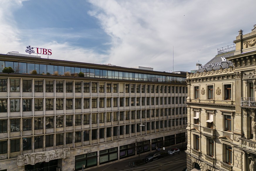 epa10530317 A general view shows the headquarters of the Swiss bank Credit Suisse (R) and UBS (L) at Paradeplatz in Zurich, Switzerland, 18 March 2023. Shares of Credit Suisse lost more than one-quart ...