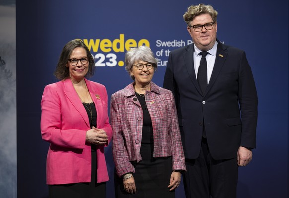 epa10430846 (LR) Swedish Migration Minister Maria Malmer Stenergard, Swiss Federal Councilor Elisabeth Baume-Schneider and Swedish Justice Minister Gunnar Strommer attend the first information...