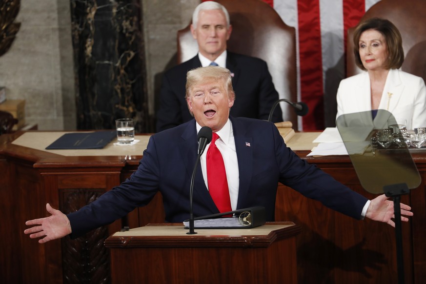 epa08193711 US President Donald J. Trump (B) delivers his State of the Union address in front of Vice President Mike Pence (L) and Speaker of the House Nancy Pelosi during a joint session of congress  ...