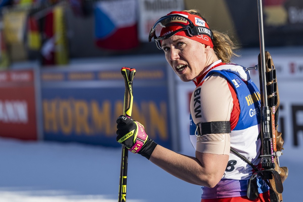 Lena Haecki-Gross of Switzerland reacts at the finish line during the womens 15k individual race at the IBU Biathlon World Championships, on Tuesday, February 18, 2025, in Lenzerheide, Switzerland. (K ...