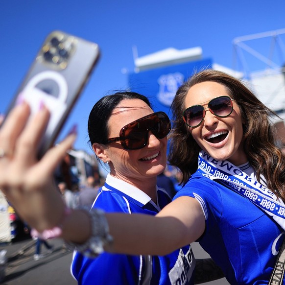 Football - Premier League - Everton v Ipswich Town 3rd May 2025 - Premier League - Everton v Ipswich Town - Two female Everton fans pose for a selfie outside Goodison Park before the match - Photo: Si ...