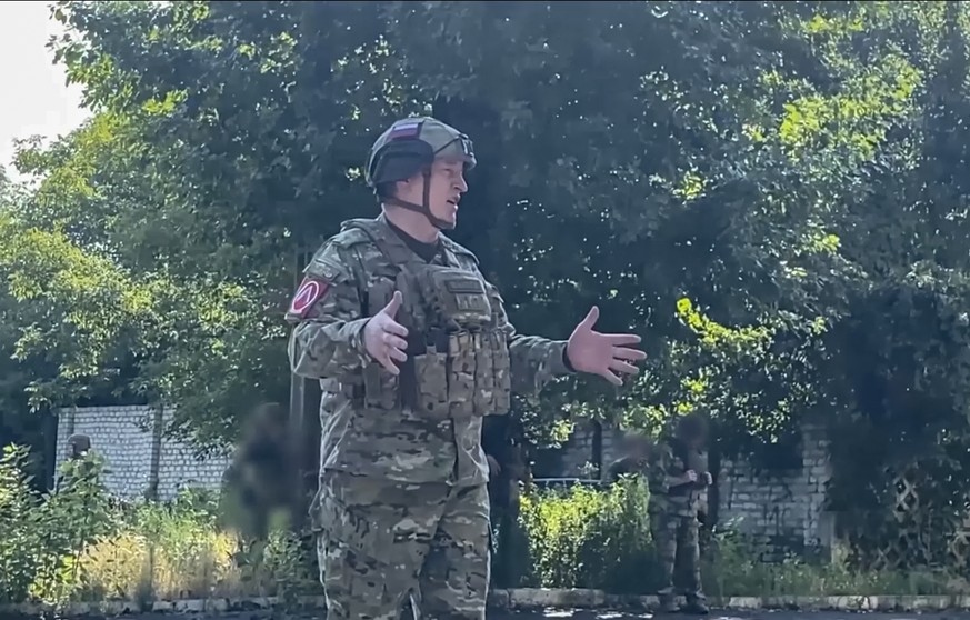 epa10111265 A still image taken from a handout video released by the Russian Defence Ministry Press Service on 08 August 2022 shows Russian Commander of the Central Military District Colonel-General A ...