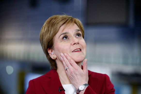 epa06017981 Scottish National Party (SNP) leader Nicola Sturgeon looks up at the Emirates Arena in Glasgow, Scotland, Britain, 09 June 2017. Sturgeon&#039;s party lost seats to the Conservatives, Labo ...