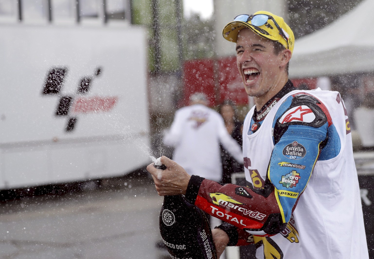 Spain&#039;s rider Alex Marquez of the EG 0,0 Marc VDS sprays champagne to celebrate his victory in the Moto2 race at the Czech Republic motorcycle Grand Prix at the Automotodrom Brno, in Brno, Czech  ...