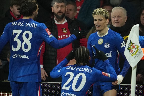 Chelsea players celebrate after a goal during the fifth round FA Cup soccer match between Wrexham and Chelsea in Wrexham, Wales, Saturday, March 7, 2026. (AP Photo/Jon Super)
Britain FA Cup Soccer