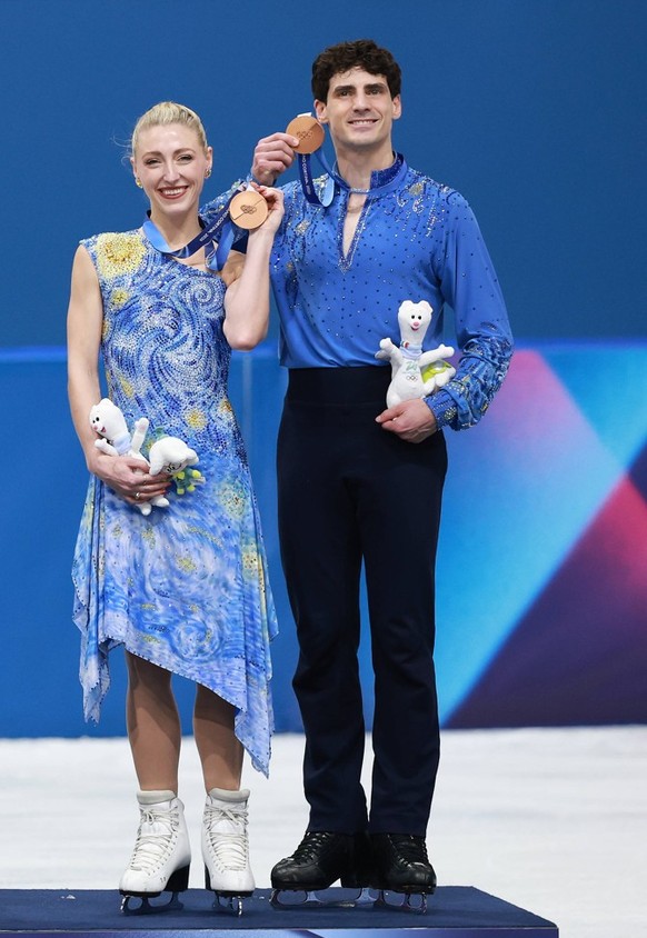 MILAN, ITALY - FEBRUARY 11: Silver medalists Madison Chock and Evan Bates of Team United States, gold medalists Laurence Fournier Beaudry and Guillaume Cizeron of Team France, bronze medalists Piper G ...