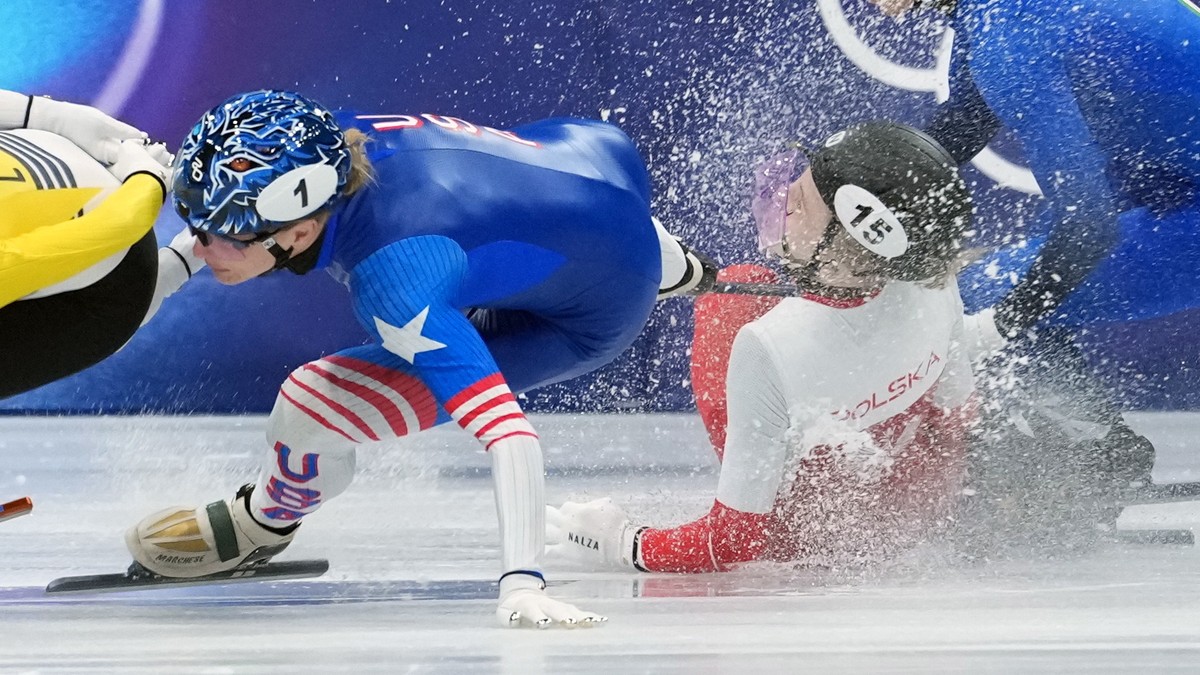 Poland's Kamila Sellier (15) is injured after crashing and being struck in the face with a skate blade while competing during a short track speed skating women's 1,500 meters quarterfinal at ...