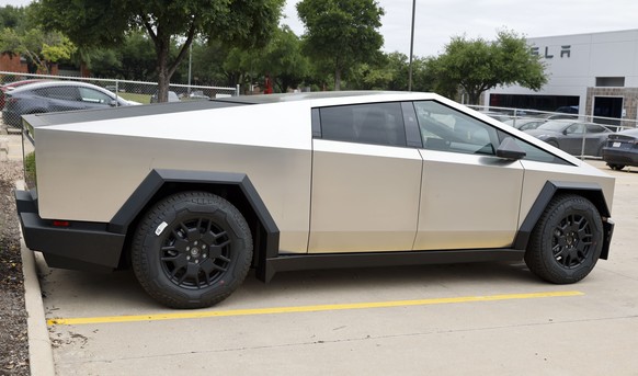 epa11289314 A general view of a Cybertruck parked in a parking lot in Austin, Texas, USA, 19 April 2024. Tesla has recalled all 3,878 of their Cybertrucks due to a faulty accelerator pedal which can b ...