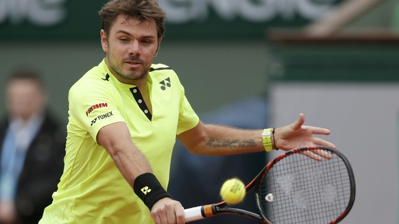 Tennis - French Open - Roland Garros - Switzerland&#039;s Stan Wawrinka vs Czech Republic&#039;s Lukas Rosol - Paris, France - 23/05/16. Switzerland&#039;s Stan Wawrinka returns the ball. REUTERS/Gonz ...