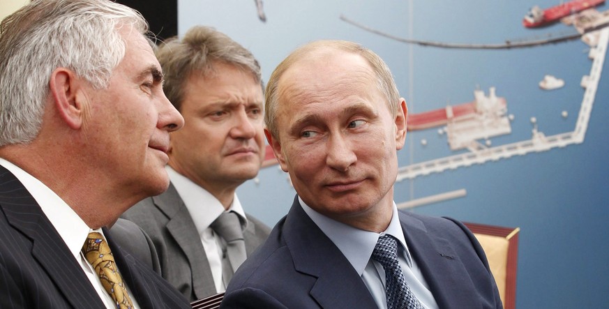 epa05669527 (FILE) A file picture dated 15 June 2012 shows Russian President Vladimir Putin (R), Krasnodar region Governor Alexander Tkachev (C) and ExxonMobil Chairman and CEO Rex Tillerson (L) atten ...