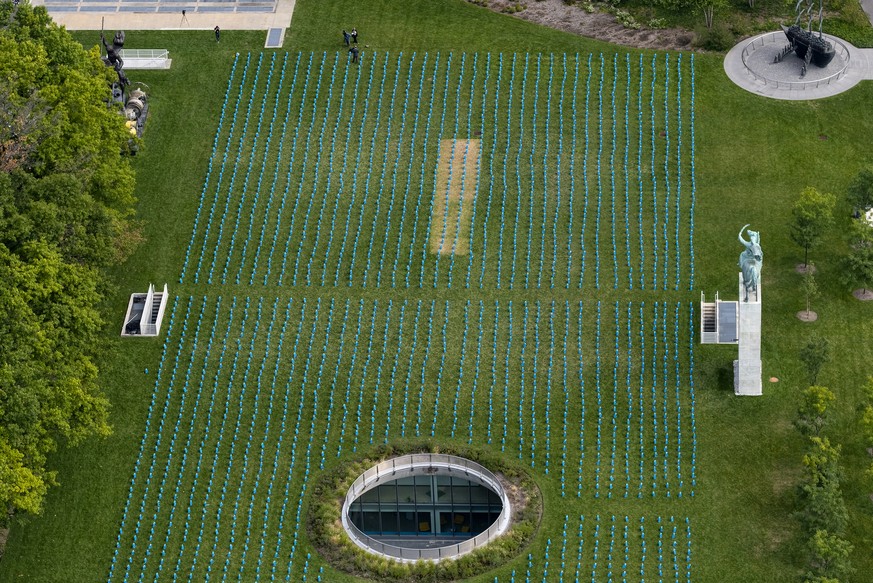 Thousands of school backpacks are laid out in an installation on the North Lawn of the United Nations Sunday, Sept. 8, 2019. The installation, created by UNICEF, illustrates the scale of child deaths ...