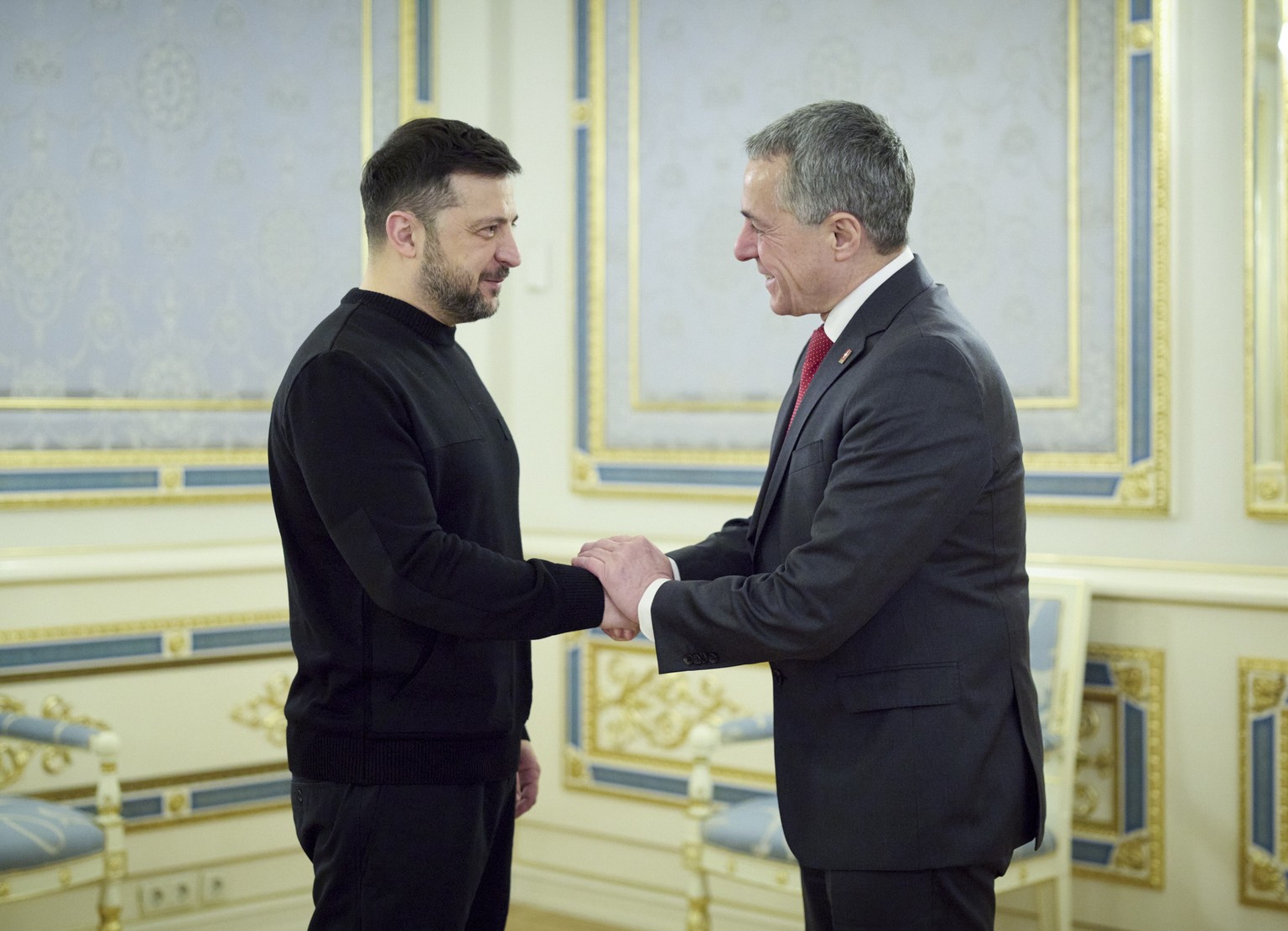 epa12701010 A handout photo made available by the Presidential Press Service shows Ukrainian President Volodymyr Zelensky (L) meeting with Swiss Federal Councilor and Chairperson-in-Office of the Orga ...