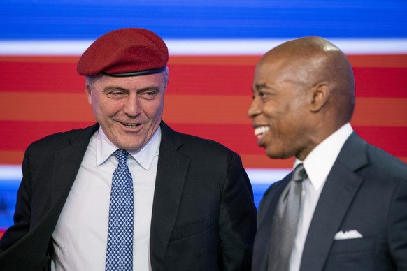 Republican candidate for New York City mayor, Curtis Sliwa, right, and Eric Adams, Brooklyn borough president and Democratic mayoral candidate smile after a debate at the ABC-7 studios in New York, Tu ...