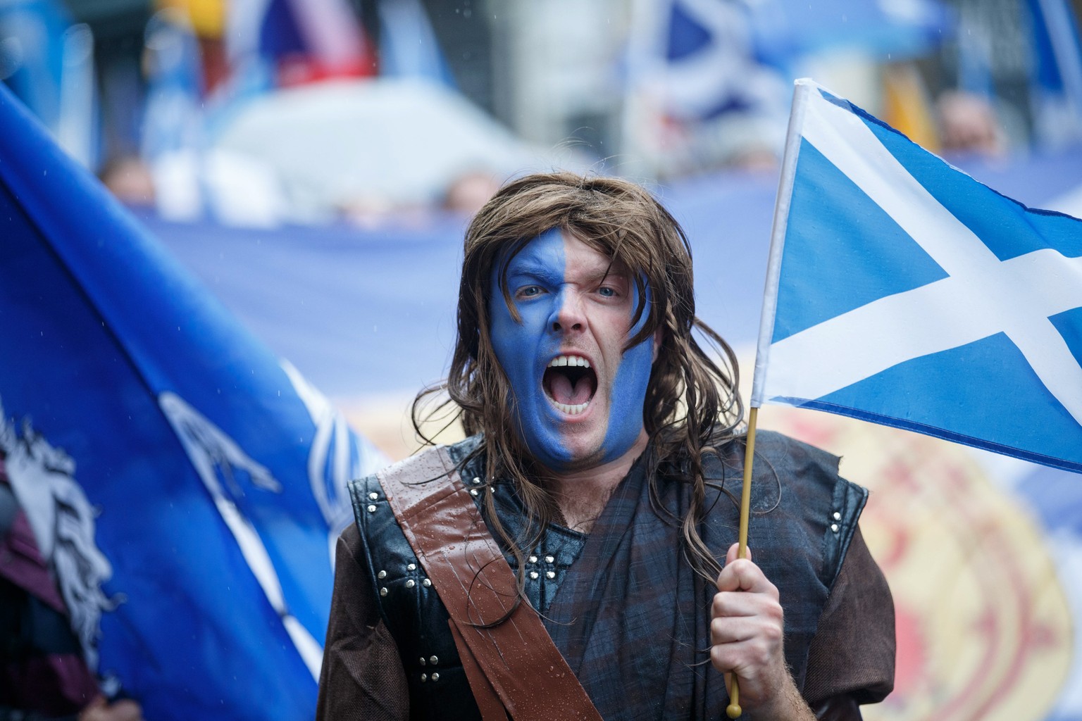 epa07898716 People gather for the AUOB (All Under One Banner) march for Scottish Independence in the streets of Edinburgh, Scotland, 05 October 2019. Organisers of &#039;All Under One Banner&#039; sai ...