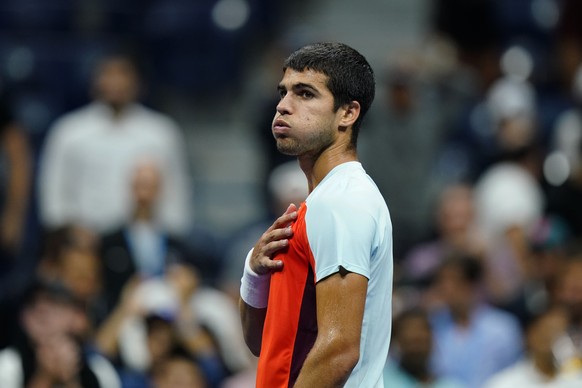 Carlos Alcaraz, of Spain, looks at the crowd after beating Jannik Sinner, of Italy, during the quarterfinals of the U.S. Open tennis championships, early Thursday, Sept. 8, 2022, in New York. (AP Phot ...