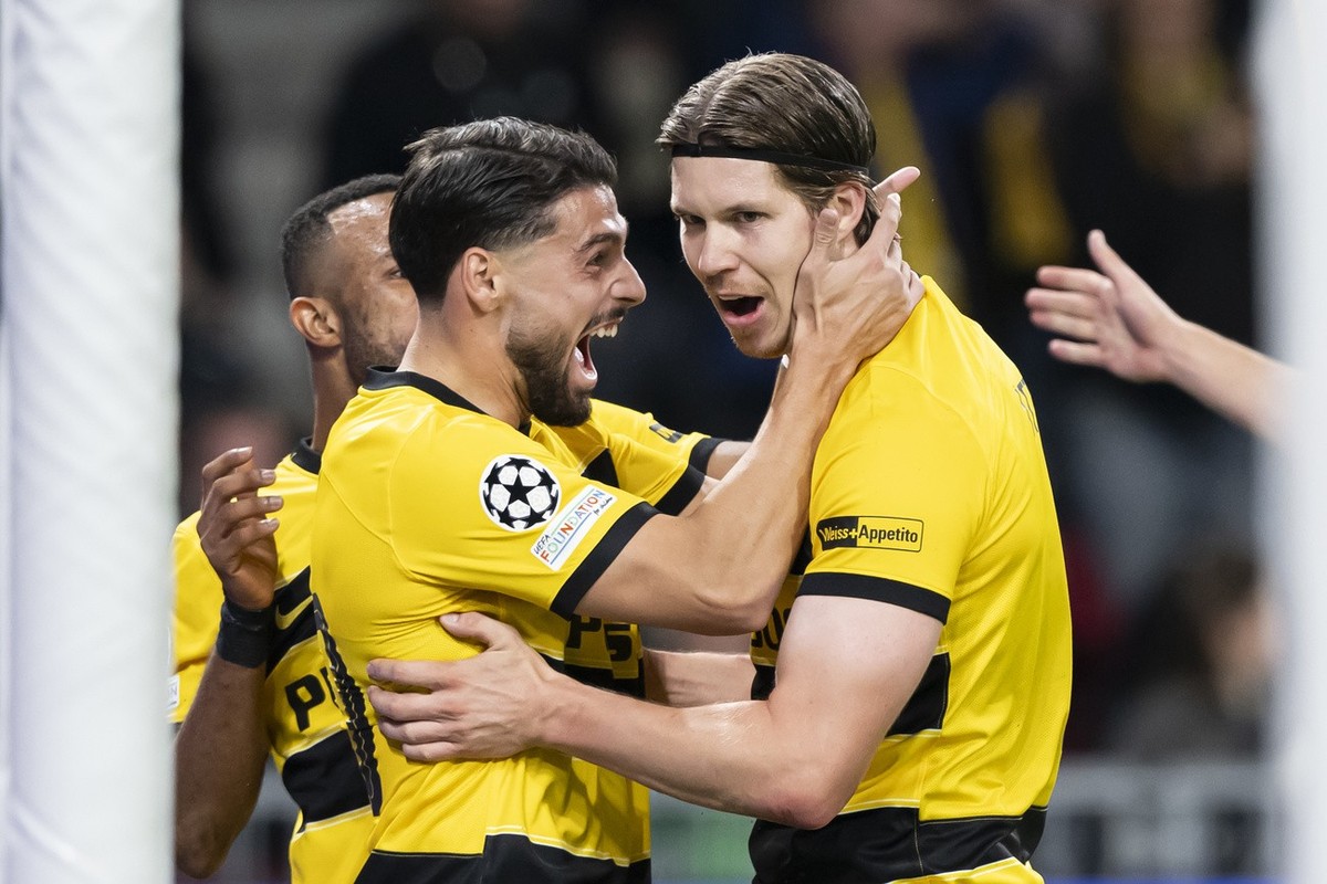 YB?s Cedric Itten, right, celebrates after scoring the 1-0, with YB's Kastriot Imeri, left, during the UEFA Champions League Play-offs 2nd leg match between Switzerland's BSC Young Boys and  ...