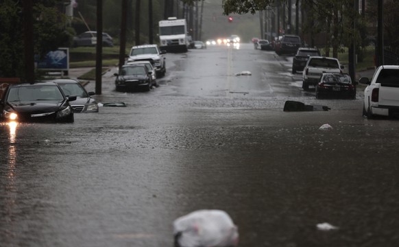 Parked vehicles along Belvedere Street are stranded by flooding as heavy rain falls, Saturday, April 5, 2025, in Memphis, Tenn. (Patrick Lantrip/Daily Memphian via AP)
APTOPIX Severe Weather Memphis