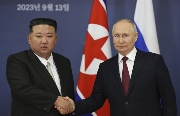FILE - Russian President Vladimir Putin, right, and North Korea&#039;s leader Kim Jong Un shake hands during their meeting at the Vostochny cosmodrome outside the city of Tsiolkovsky, about 200 kilome ...