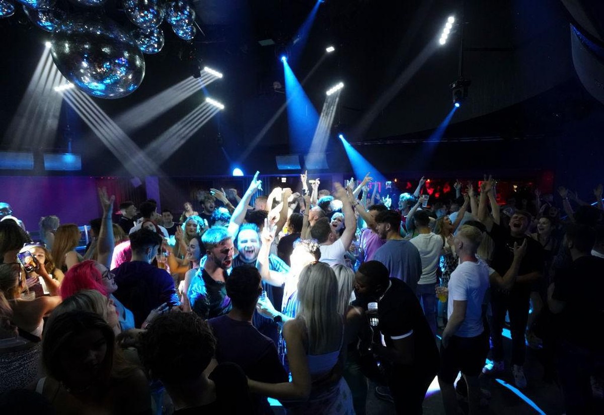 Clubbers take to the dance floor just minutes after Pryzm nightclub threw open its doors to celebrate the relaxing of Covid-19 rules in the early hours of July 19, 2021 in Brighton, England. At a minu ...