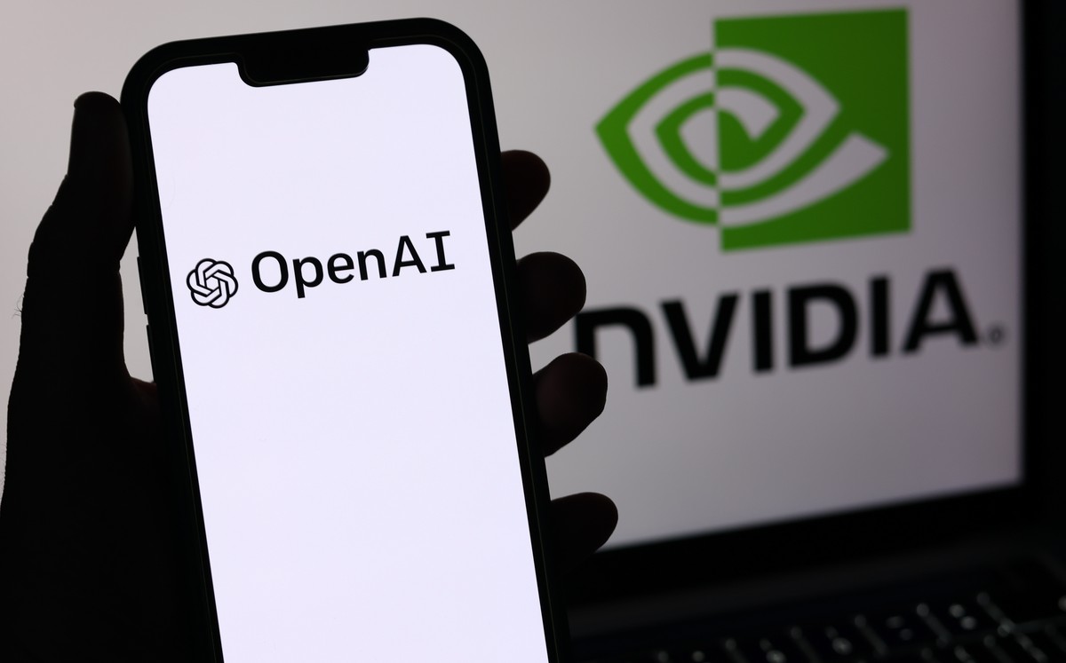 epa13026208 The OpenAI and Nvidia logos are displayed on a mobile phone and laptop screen in Liverpool, Britain, 09 June 2026. Leading AI (artificial intelligence) and technology companies Anthropic,  ...