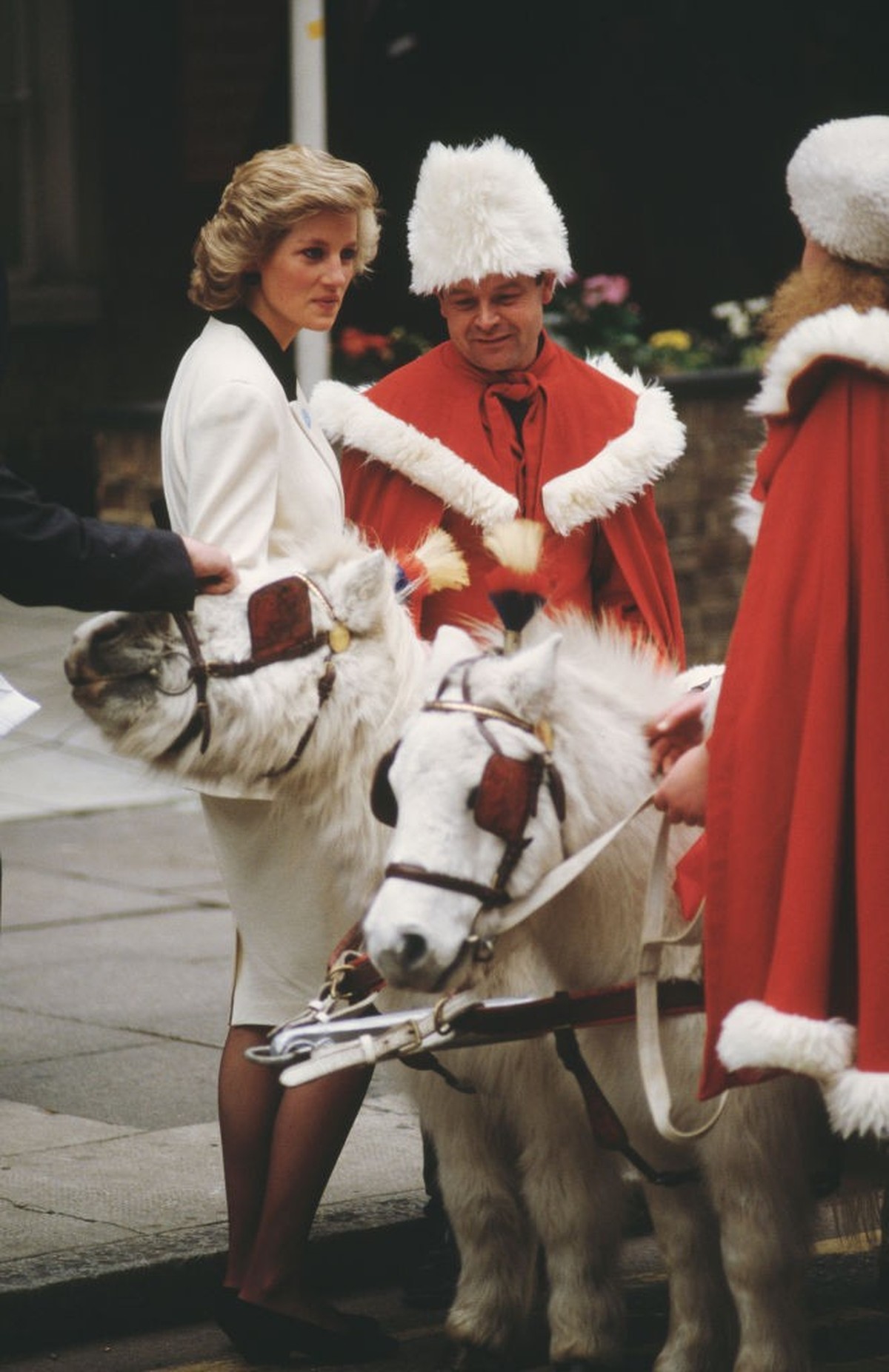 WINDSOR, ENGLAND - DECEMBER 08: Queen Elizabeth II thanks volunteers and key workers at Windsor Castle on December 08, 2020 in Windsor, England. The Queen and members of the royal family gave thanks t ...