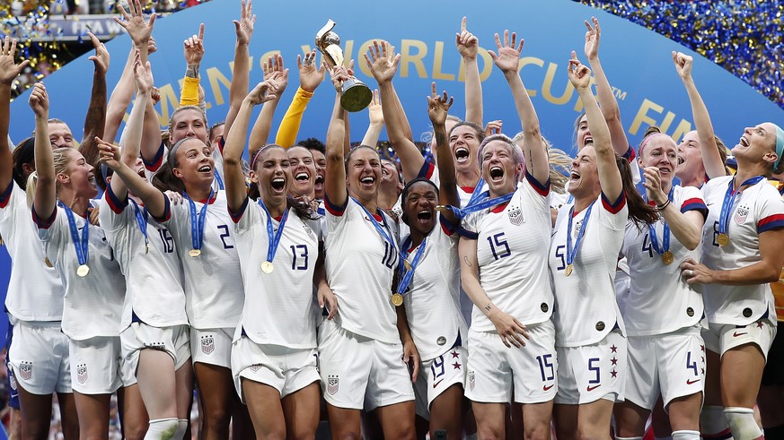 epa07701905 The USA team celebrate after winning the FIFA Women&#039;s World Cup 2019 final soccer match between USA and Netherlands in Lyon, France, 07 July 2019. EPA/IAN LANGSDON