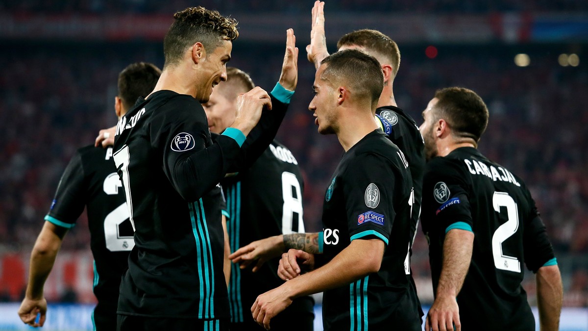 epa06692927 Real Madrid's Marco Asensio (L) celebrates scoring with Real Madrid's Cristiano Ronaldo (2-L) during the UEFA Champions League semi final, first leg soccer match between Bayern M ...