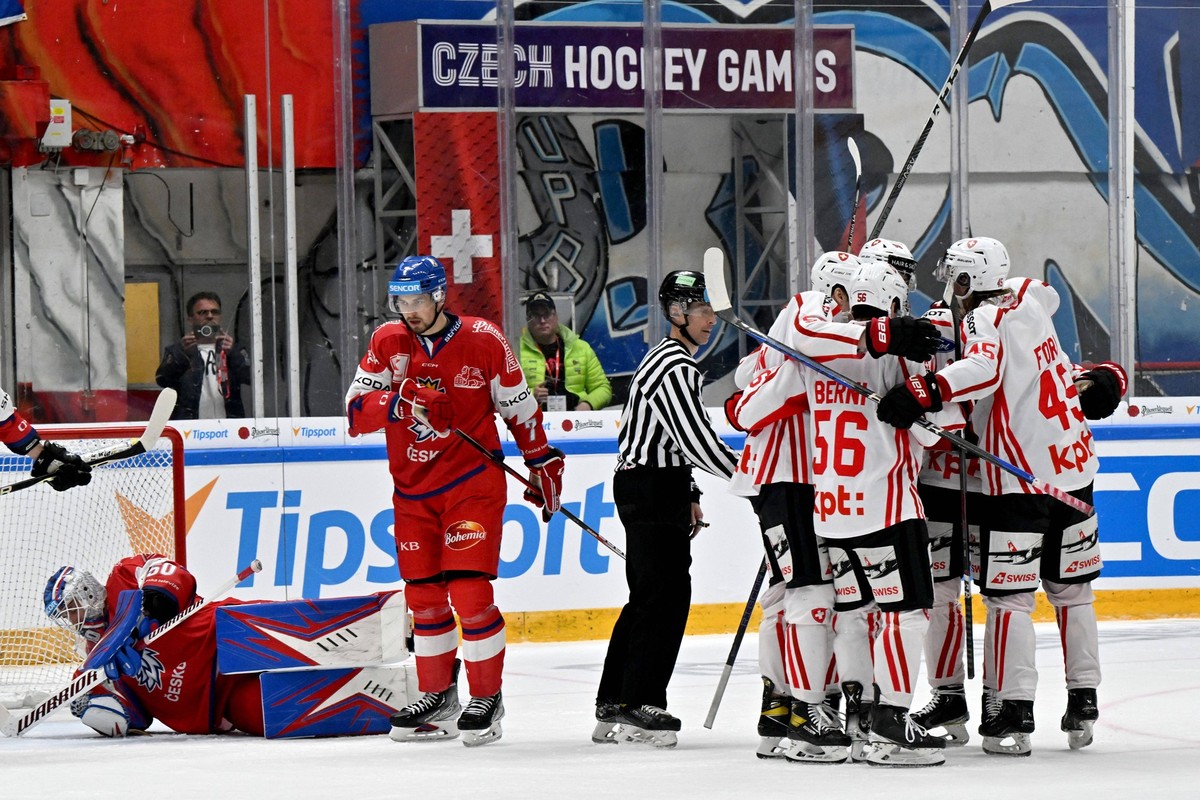 Hockey players of Switzeland celebrate goal and victory after the Euro Hockey Challenge match Switzerland vs Czech Republic in Brno, Czech Republic, May 7, 2023. From left sad Czech goalie Karel Vejme ...