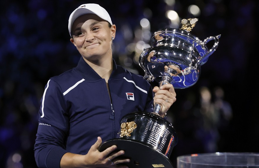 Ash Barty of Australia holds the Daphne Akhurst Memorial Cup after defeating Danielle Collins of the U.S., in the women&#039;s singles final at the Australian Open tennis championships in Saturday, Ja ...