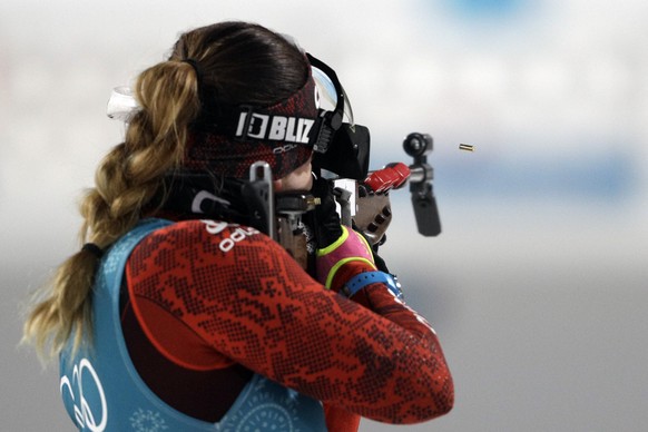 Switzerland's Lena Haecki shoots with her rifle during a Biathlon training session at the 2018 Winter Olympics in Pyeongchang, South Korea, Monday, Feb. 19, 2018. (AP Photo/Gregorio Borgia)
