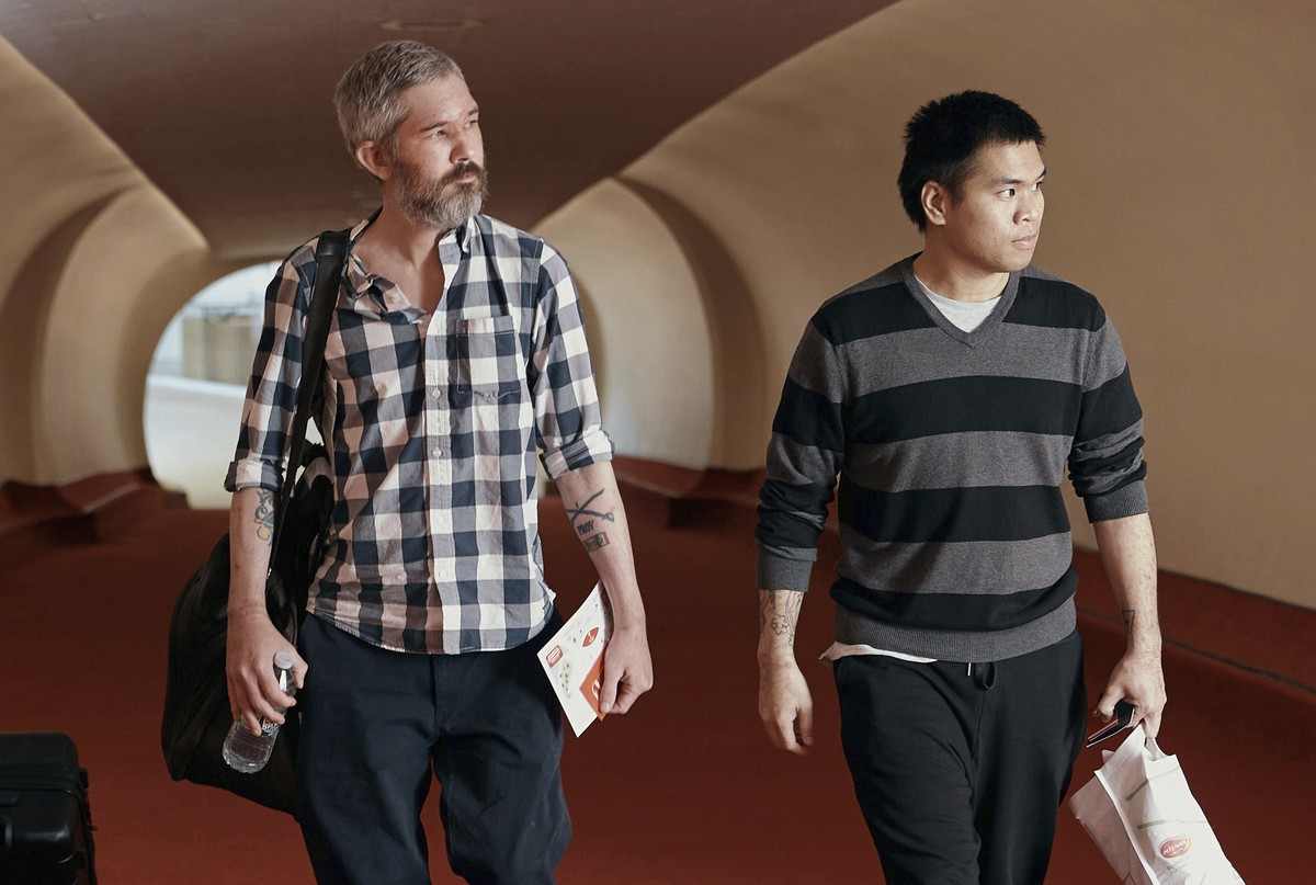 American's Andy Huynh, right, and Alex Drueke arrive at the TWA Hotel on Friday, Sept. 23, 2022 in New York. The two U.S. military veterans, who disappeared three months ago while fighting Russia ...