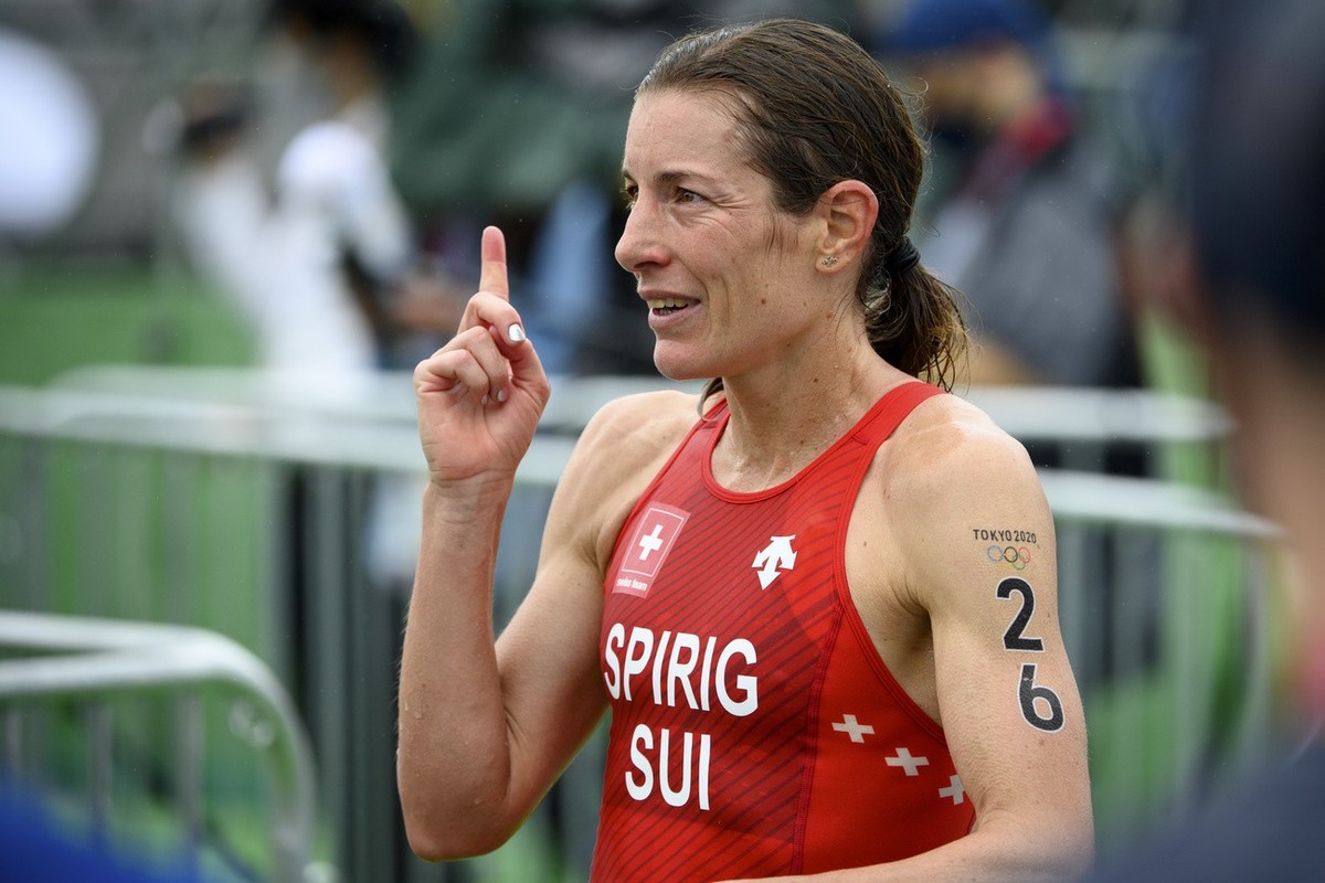 Nicola Spirig of Switzerland smiles as she speaks to journalists after the women's individual triathlon competition at the 2020 Tokyo Summer Olympics in Tokyo, Japan, on Tuesday, July 27, 2021. ( ...