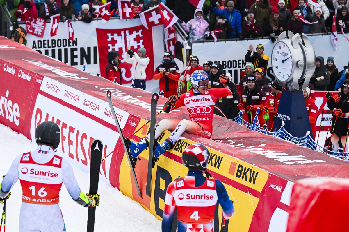 Second placed Aleksander Aamodt Kilde of Norway and third placed Filip Zubcic of Croatia watch Marco Odermatt of Switzerland celebrate after winning the second run of the men's giant slalom race  ...