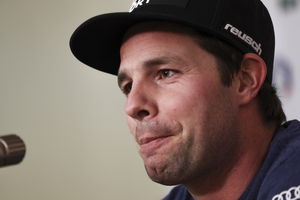 Switzerland's Beat Feuz meets the media during a press conference in Bormio, Italy, Monday, Dec. 26, 2022. (AP Photo/Alessandro Trovati)