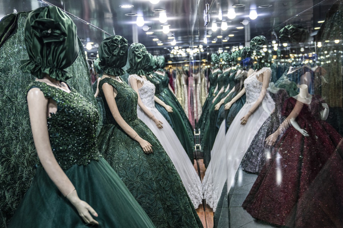 Mannequin's heads are covered in a wedding store in Kabul, Afghanistan, Monday, Dec. 26, 2022. Under the Taliban, the mannequins in women's dress shops across the Afghan capital Kabul are a  ...