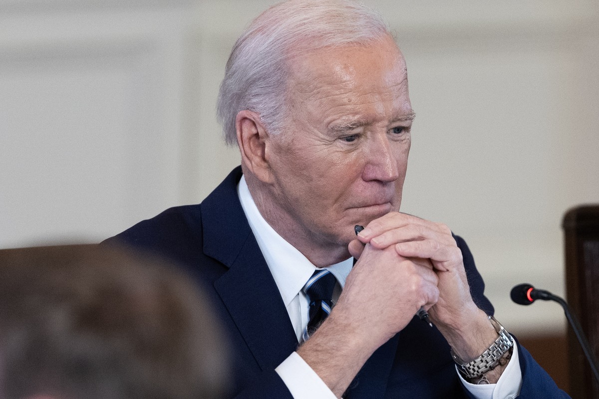 epa11217201 US President Joe Biden listens in during a meeting with Poland's President Andrzej Duda, in the East Room of the White House in Washington, DC, USA, 12 March 2024. US President Biden  ...