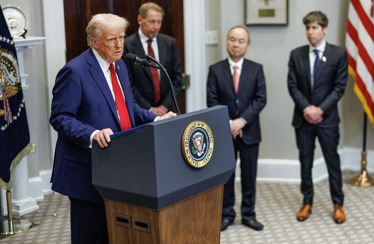 epa11843502 US President Donald Trump (L) gives remarks on artificial intelligence (AI) Infrastructure as Larry Ellison (2-L), Chief technology officer of Oracle, Masayoshi Son (2-R), CEO of SoftBank, ...
