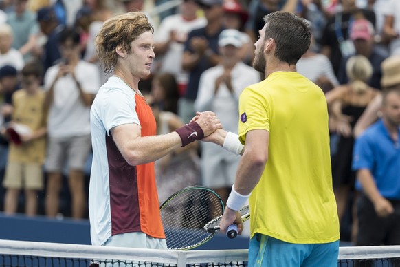 epa10162278 Andrey Rublev (L) of Russia after defeating Cameron Norrie (R) of the United Kingdom in their fourth round match of the US Open Tennis Championships at the USTA National Tennis Center in t ...