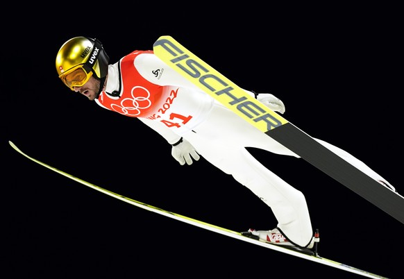 epa09749210 Kilian Peier of Switzerland in action during the trial round of the Men&#039;s Ski Jumping Large Hill final at the Zhangjiakou National Ski Jumping Centre at the Beijing 2022 Olympic Games ...