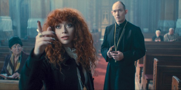 Russian Doll. (L to R) Natasha Lyonne as Nadia Vulvokov, Ákos Orosz as Father Laszlo in episode 205 of Russian Doll.